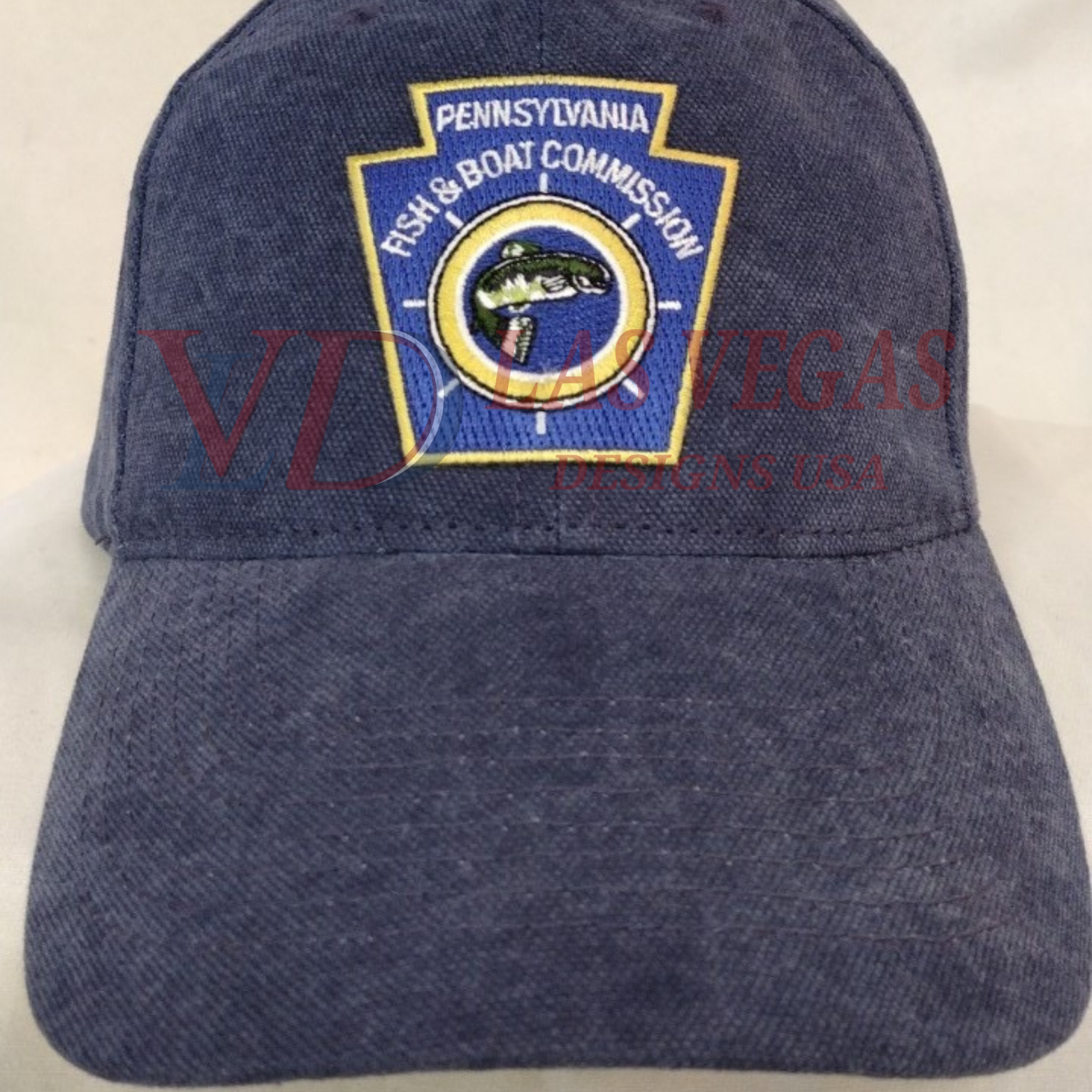 Pennsylvania Fish and Boat Commission logo embroidery stitched on caps