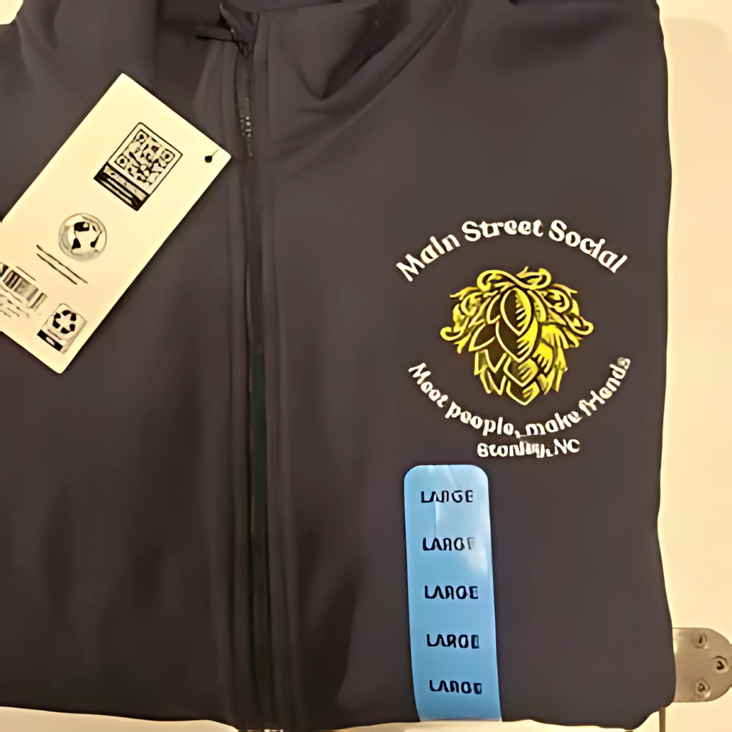 Main Street Social left chest logo stitched on softshell jacket
