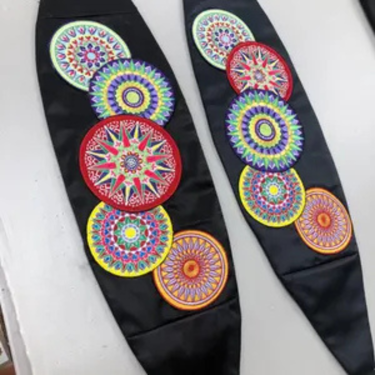 Mandala embroidery sample patches stitched on fabric
