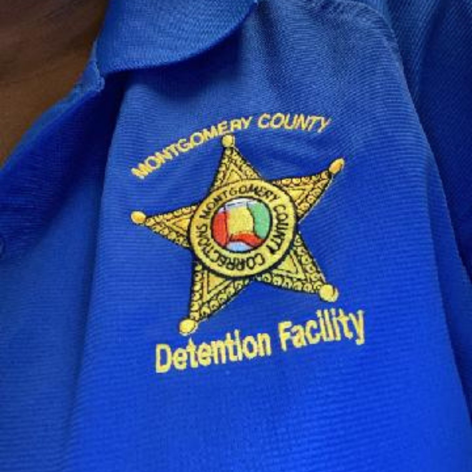 Montgomery County Detention Facility star emblem stitched on work polo